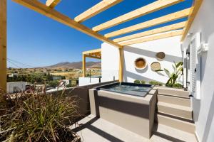 Фотография из галереи LOFTS the summer village apartments в городе Mármara +32 фотографии