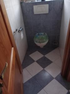 Koupelna v ubytování Tweepersoonskamer met gezamenlijk gebruik van badkamer en toilet