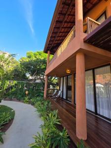 En balkon eller terrasse på Vila Anambé Serra Grande BA + 17 billeder