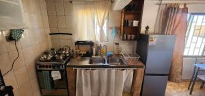 Kuchyň nebo kuchyňský kout v ubytování Casa Maxima