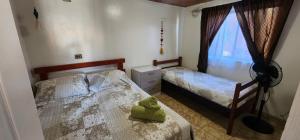 Postel nebo postele na pokoji v ubytování Casa Maxima