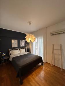 En eller flere senge i et værelse på Elegant Flat Near Hospitals & Museums