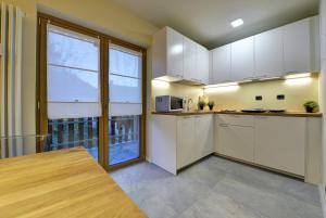 Kuchyň nebo kuchyňský kout v ubytování Le Reve de Marisa