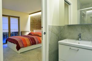 Postel nebo postele na pokoji v ubytování Le Reve de Marisa