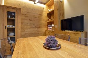 TV a/nebo společenská místnost v ubytování Le Reve de Marisa