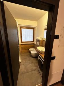 Koupelna v ubytování Tilde