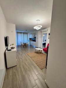 TV a/nebo společenská místnost v ubytování Residenza Tramontana