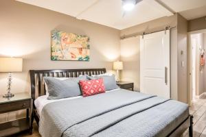 Ένα ή περισσότερα κρεβάτια σε δωμάτιο στο Kihei Akahi C210 +46 φωτογραφίες