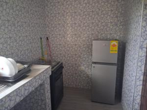 Kuchyň nebo kuchyňský kout v ubytování Acrra' Rent