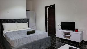 Postel nebo postele na pokoji v ubytování Acrra' Rent