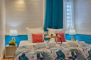 Ένα ή περισσότερα κρεβάτια σε δωμάτιο στο Villa Dezi F3 avec piscine +44 φωτογραφίες