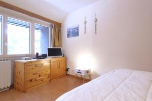 TV a/nebo společenská místnost v ubytování PILA: Mono Condominio G7 - Fun in Paradise