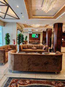 Posezení v ubytování رؤيا الفخامة للشقق الفندقية