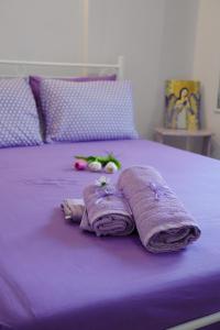 Postel nebo postele na pokoji v ubytování Χαμένος στον παράδεισο