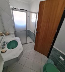 Koupelna v ubytování Sobrado em Imbé - RS + 9 fotografií