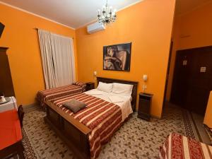 Una cama o camas en una habitación de Hotel Europa