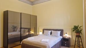 Giường trong phòng chung tại Sirul Livezii Central Flat