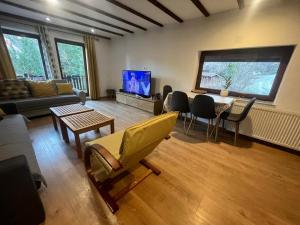 TV a/nebo společenská místnost v ubytování Great Escape Villa