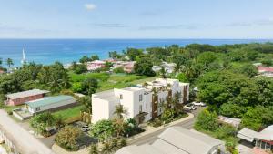 an aerial view of a resort with the ocean in the background at Elegant LUX 2BR 3mins to Beach Pool & Deck in Saint James +8 photos