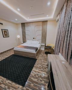 Ένα ή περισσότερα κρεβάτια σε δωμάτιο στο Covchil Executive Guest House +4 φωτογραφίες