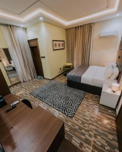 Ένα ή περισσότερα κρεβάτια σε δωμάτιο στο Covchil Executive Guest House