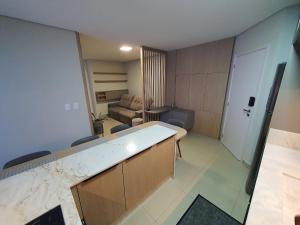 Giường trong phòng chung tại Apto novo 2 quartos 2 banheiros garagem e varanda