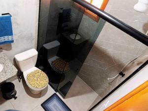 Koupelna v ubytování SUÍTES PRIVATIVA em Brotas - + 37 fotografií