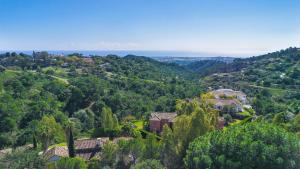an aerial view of a village in the hills at VILLA AMIRA ,Marbella Estepona in Benahavís