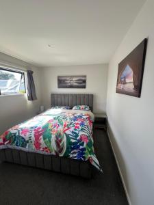 En eller flere senge i et værelse på Sun and fun in the Bay