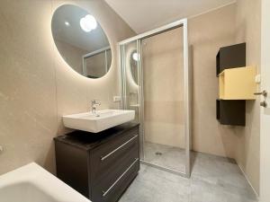 Koupelna v ubytování Treehouse - Alpinlake Apartments + 16 fotografií