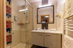 Koupelna v ubytování Erlys Cityhotel + 43 fotografií