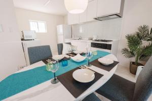 Køkken eller tekøkken på Sunstone Residence 2F - Free Rental Car included!