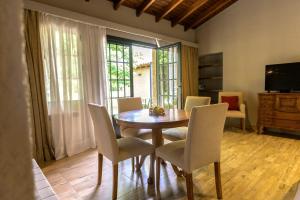 TV a/nebo společenská místnost v ubytování Posada Verde Oliva