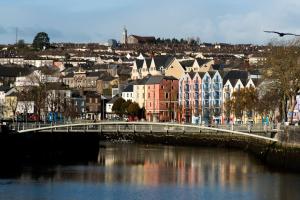 a bridge over a river in a city with buildings at 13 Frankfield Terrace, Summerhill South, Cork, T12 PY79 in Cork