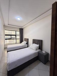 Postel nebo postele na pokoji v ubytování River Place Appartement