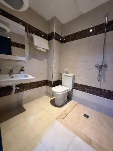 Koupelna v ubytování River Place Appartement