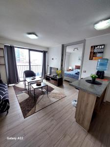 Posezení v ubytování Departamento Centro Vista al mar 1D 1B