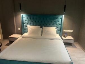 Кровать или кровати в номере Atlanticblu hotels & Resort