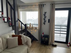 Khu vực ghế ngồi tại Domek Na Wzgórzu Roztocze