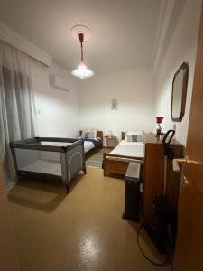 Postel nebo postele na pokoji v ubytování Zozefina apartment