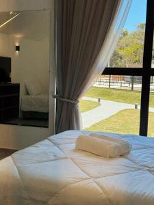 Giường trong phòng chung tại Mandacaru Encantado +5 ảnh