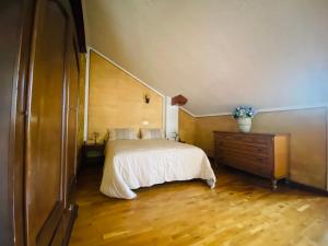 Postel nebo postele na pokoji v ubytování Villa i 2 Pini