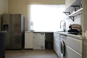 Η κουζίνα ή μικρή κουζίνα στο Corridoni Suites