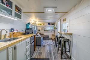 a kitchen with a sink and a counter top at Mountain Top Cabin with a View - Bear Cabin in Ruidoso