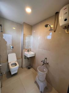 Koupelna v ubytování Hotel Golden Leaf