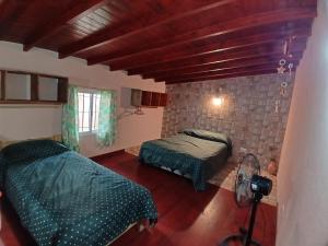 Ένα ή περισσότερα κρεβάτια σε δωμάτιο στο Miniduplex tipo Cabaña +3 φωτογραφίες