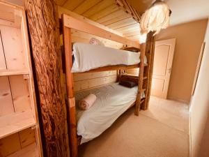 Postel nebo postele na pokoji v ubytování Bambytwo