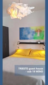 Postel nebo postele na pokoji v ubytování Trieste guest house