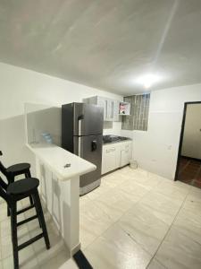 Køkken eller tekøkken på Paradise in Santa Marta + 9 billeder