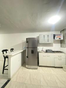 Køkken eller tekøkken på Paradise in Santa Marta